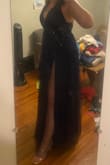 The bust ran a little big and it is long. I really like it, but it almost feels like a nightie because of all the tulle and lace. If you dress it up with nice shoes and jewelry, I think it works. - Ross F.