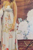 Beautiful dress! It ran a little large on me; I needed a bigger size for the bust (I was 6 weeks postpartum when I wore it). So the rest of it was a tad large but still fit. The length was perfect which was a very pleasant surprise due to my height! - Amanda P.