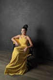 I absolutely love this yellow dress! The color is stunning, the fit is flattering, I didn't have to help it (though I did have 4" heels on), and the neckline makes it extra special. Get this dress - it's a head-turner! Got this dress for a photoshoot and it did not disappoint! - Alexia P.