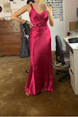 I am going to be a bridesmaid in my friend's wedding, and this is the dress she has us get. The size I got fits me well, and it's a great dress overall, but there is an awkward extra amount of fabric around the stomach. The dress hits my hips at a weird place (it might just be me though, I have a short torso and long legs.) - Miranda S.