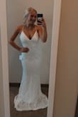 This dress was stunning. Needs to be hemmed as my daughter is only 5'2" but fit her like a glove. - Brynn H.