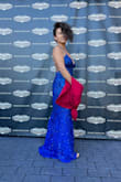 What a stunning dress! I was finally able to wear this dress to an event. I had to get 3" hemmed. The dress is form fitting and easily adjustable with the tied straps. Be careful of potential nip slips if you bend down and twist. - Alice C.