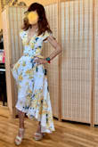 This is fresh and bright and summery. It fits well due to the zip at back and the material is cool and hangs well. Probably good for semi-special occasions. It's a big change for me but I like the high low as they always flow well when you walk. - Rachel M.