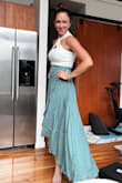 The skirt fits perfectly and is really flattering. I paired it with another Lulus white top. Would work well with a bodysuit too! - Sherri I.