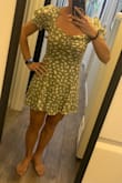 This dress is so cute and flattering. Fit as you would expect and I definitely recommend it. :) - Sami K.