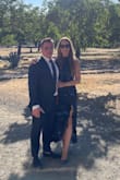 This dress is beautiful and fits very well. The slit is a bit high on my thigh so keep that in mind based on the event you're wearing the dress to. - Caitlyn S.