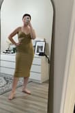 The dress is so cute and way comfortable! However, the color was much different than expected. The best way for me to describe the color would be a mustard tan (much darker than I thought it'd be). - Heidee T.