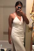 This dress is stunning! Quality of fabric is super good - not see through and no need for a bra. Cleavage and side boob can be easily secured with a Hollywood tape. If you are a US size 4 like me, opt for S. I usually choose M for shirts but after reading the reviews, I'm super glad I ordered an S. - Ritzelle A.