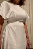 It is tight in the boobs and somewhat tight in the waist, but I'm currently on a diet (lost 17# so far!) and this will give me the incentive to lose more :) I bought it for my 25-year vow renewal I have planned for February 2023. It is such a pretty dress and I'm so glad I found it! - Karen C.