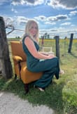 I am 5'7", 160ish lbs, athletic. This jumpsuit is not meant for those with a long torso. I would say I have a regular-length torso but did feel as if it rode up a bit in the front area. Also, I know I have a wider rib cage than many, so there was a challenge zipping up, and it was right around my ribs. 
A little darker emerald green than what I expected in online photos.
Otherwise, it was a fun piece to wear and I might wear it again someday! - Leah M.