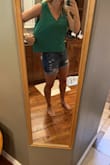 Looking for a daily wear/more comfortable tank. I am an active person and like some stretch in my tops if I'm just trying to do errands and house cleaning and other busy daily activities so this top was too restrictive for me. Great for a business top kind of energy. The medium was a little big for me and was showing my bra as it slid around since the fabric was more silky. If you're between sizes you might be able to go down a size. - Kelly G.