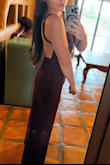 I bought the burgundy jumpsuit for a wedding. The size small jumpsuit fit exactly perfectly on my waist and chest. I loved that it has adjustable straps to make it exactly how you want it to fit. I'm 5'2 on the shorter side so I had to wear some taller heels but it wasn't that much of a problem. The fabric is really great quality and feels really nice and expensive looking. I got a lot of compliments throughout the night. - Genises M.