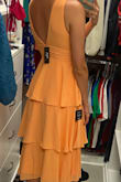 This dress is so perfect for weddings, showers, and all the events. It's comfortable and flowy and is a beautiful light orange color! Love that it hits me at the knee as well since I am a taller woman. - Kellyn S.