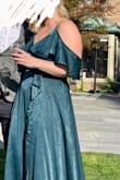Finally a true wrap dress! Soft and quality fabric too. Fit perfectly with heels, sleeves fit perfectly as well. Adjustable straps were very helpful as well as the clasp in the bust area to keep it all together. Would buy it again! - Tehilla B.