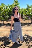 I've worn this twice now and I would definitely wear it again! Not the best skirt for sitting for long periods of time because the waist is quite tight and I'm more comfortable with it unhooked after a long dinner but in standing it's very comfortable and beautiful! - Sara L.