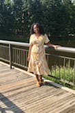 Casual spring dress. Love there is a second layer under it. No need to wear a cami or shorts under. - Coco T.