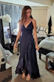 Bought this for my 21 yo daughter to wear to my son's wedding. She is very slim and short and very picky about her clothes. Because of the lace-up back and the hi-low skirt it fits her perfectly!! And it's so flattering on too. She always complains that so many dresses make her "look like a boy" but not this one. And it doesn't need alterations at all, the length is perfect for her wearing 3" heels. Love, love, love this dress! - Brenda M.