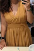 I would have to exchange it for the red color. The fit was beautiful, I was worried it would be too low cut for my taste but it was fine. The gold just wasn't my color. - Alexis C.