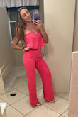 Received so many compliment on this pantsuit! It is so stretchy and comfortable. Bust was slightly large on me, but the Small fit perfectly otherwise. I ordered this after I saw my bestie wearing it out in the reddish color. I ordered pink. - Caitlin M.