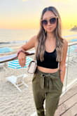 I've worn these pants to work, beach, night out, brunch, etc. and it works for so many different looks! They're great material. I like that the top buttons snap, it's just a quicker closure. - Josie C.