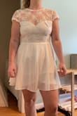 This is super cute & comfortable. I love how flowy it is - you really can't tell it's a Romper. I plan on changing into this dress at my reception when it's time for dancing. I'm obsessed with the back. - Ashley P.