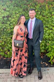 Wore this dress to a nice dinner, and plan to wear it to a fall wedding. It fits great and is flattering! I'm pretty much an exact size 12 and the L fit EXACTLY right without being too tight, yet with no wiggle room. If my rib cage was slightly bigger the dress would have been too tight, not in the boob area but the actual back/band area. The hem was perfect for me at 5'7 - I could have worn flats if I wanted no issue. The material is silky and gorgeous in person! I wore a sticky bra underneath, but I bet you could get away with a strapless one if you keep the band low. - Erica D.