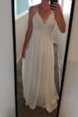 Love this dress! Will be wearing it for my wedding. The straps are just a tad bit flimsy so I worry about adjusting them too much, but overall the material is very nice. It fits extremely well but I may have the waist altered just slightly to be a little more fitted. - Tracy G.
