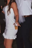 Wore this at the end of my wedding reception to party in! True to size! I ordered my normal medium and it fit great not see-through & stretch material for comfort! - Melissa B.