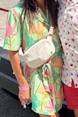 I've only worn this dress once so far but it worked out great. I went to an 80s themed sip and stroll and thought the colors were perfect for the event. I got many compliments! Definitely a looser fit but I think that is by design. - Emily D.