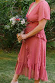 Wore this as a bridesmaid. It was perfect for the occasion. I was worried the slit was going to be too revealing but it was actually pretty flattering. - Clare H.