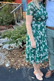 Loved the color of this dress. Was very comfortable but my only complaint is the elastic rides up and the dress bunches in the bust. Looked great when pulled down but if you run small in the bust I would consider sizing down because the waist elastic is very stretchy/forgiving. - Claire C.