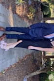Bought this dress last minute for a wedding (cocktail attire dress) and I am so happy I did! It was a perfect length, so comfortable, and I felt it was very flattering. For me, I did not wear a bra with this dress due to sizing on the top. It did not hold heat, which is great as a sat in the sun! Would 10/10 recommend this dress! - Jenna V.