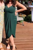 I wore this to a wedding and got so many compliments on it. The color is gorgeous and I'm so glad I bought it. I have a large bust so it can be difficult to find a flattering fit that isn't too much cleavage, but this one for great! It felt a little tight in the bust, but it was probably because I made sure the straps were really tight (went braless) and it still wasn't uncomfortable! - Megan K.