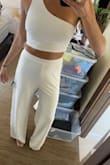 I bought this to wear to fancy dinner parties/girls night out and love it. The fabric is A LOT thicker than I thought it would be, so it might be too warm to wear for a super hot summer night but I actually appreciate the thickness- it's not see-through and hides any cellulite etc etc.. It's also a perfect length for tall gals and fits well. The top and bottoms both have hidden zippers for easy dressing. Love this purchase! - Bianca G.