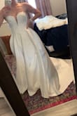 Bought this just as a backup to try on and as soon as I put it on I knew immediately it was THE dress! It fits perfectly, the material is thick, and it's overall just so beautiful! - Kasey M.