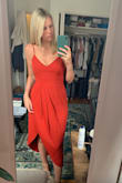 Super flattering style and true to size! The color wasn't exactly like the photo but close enough. I love the neckline and the side slit goes up just the right amount without showing too much leg. - Klara S.