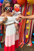 I loved wearing this set! The skirt was extremely comfortable and the off-the-shoulder top stayed put all day. Usually, I find myself constantly pulling the sleeves back into place with these types of tops. The colors are vibrant and beautiful. I received a lot of compliments. - Ashley S.