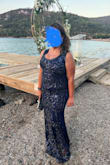 I was a bit concerned since I gained weight recently but this dress fit my frame beautifully! I wore it to a summer wedding and got many compliments! I did not have to alter it at all. My SIL tried it in and she loved it as well. - Neslihan D.
