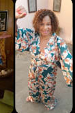 I love this jumpsuit. Purchased for an outdoor. out-of-state wedding.  Packs well.  I ordered an XL. A little loose and length is long (must wear heels or hem).  The colors are vibrant and rich!  Love the sophistication and flow. - Angela K.