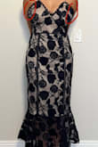 The fit of this didn't make sense for my body. The bust area was way too large and splayed outwards, but the pattern masks it. I could fit a whole fist into each side! It was huge! I didn't like the dress enough to get it tailored and will be returning it. - Priscilla C.