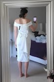 Got my rehearsal dinner dress! It fits like a glove and is so comfortable. The only thing to keep in mind is that the snaps on the bow in the back detach very easily and can be hard to stay on. Otherwise, highly recommend and LOVE this look! - Victoria L.