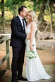 Originally had ordered a size small and could not get it zipped up, returned for a size medium which fit like a glove. The train in the back is an extra special touch. Perfect for my backyard wedding! - Courtney W.