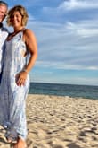 Runs large    Bought a medium and returned for a large    Runs long too   But overall fits great, very flattering, very comfortable    Highly recommend 
 this picture is a medium - Christine C.