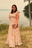 I'm always between a medium and a large and large fit perfectly. It was closer to the ground than advertised but still a good length with medium heels. Got so many compliments at a wedding! - Sofia C.
