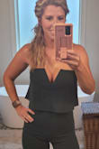 10/10 recommend this jumpsuit. Want to feel beautiful, confident, yet still conservative? Buy this! Fits like a glove and is also super comfortable. As others noted, I also was not fussing with adjusting the top all night either. I do wish they could convert this to a side zip. If you are wearing to an event and have to make multiple trips to the bathroom, it is not so fun to try and zip back up yourself. - JENNIFER W.