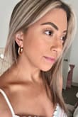 I'm not usually a fan of hoop earrings, but I thought I'd try these since they are chunky but smaller than traditional hoops. I find myself wearing them with casual and dressier outfits because they go with everything. - Joanna F.