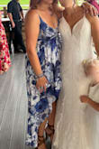This dress was great for the summer wedding due to the lightweight material and flowy high/low skirt. The little bit of silver threading doesn't show well in the pictures but it shines beautifully in the sun! Definitely need a strapless bra of sorts as the top doesn't offer much support or lift. - Dawn N.