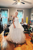 I never leave reviews, I swear. My significant other and I are having an intimate summer wedding in 2023. I wasn't looking to spend 1000s on a dress. I love so many of Lulus selections-but when I saw this one, I knew it was THE ONE. I wanted to feel like a princess while still staying true to my style.  I knew it was risky buying online, but when I saw it on sale, I felt like it was meant to be and it was. The size 4 zips up tight to fit my body LIKE A GLOVE. I feel sexy and like a princess. It is absolutely perfect. I'm truly amazed. (Please don't mind the photos, taken by my y/o lol) Looks even better in person. Truly stunning. Thank you, lulus, for making affordable wedding dresses of this quality and beauty. I am so grateful and excited!!! - Samantha D.