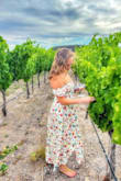 Wore it to a vineyard and it was perfect! Flows nicely,
Tight around the arms and chest a little but got so many compliments! - SARAH M.