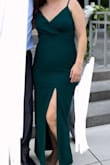 I loved this dress! It's a great dark green, I bought a dress from another site that looked like a Christmas green when it arrived but this color was gorgeous. The only thing I would change is to make the straps adjustable. I felt like I was pulling the top up and had to rig it with safety pins and fashion tape to avoid flashing everyone. - Ashley M.
